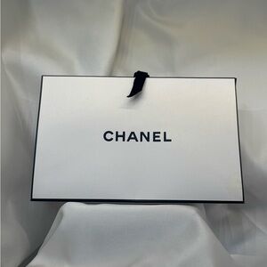CHANEL Classic White triangle Box with Black Accents